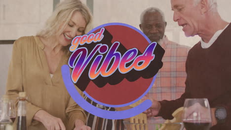 good vibes text against two senior diverse couple preparing salad together at home