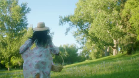 Black-Woman-on-picnic-in-park-running-away-low-angle