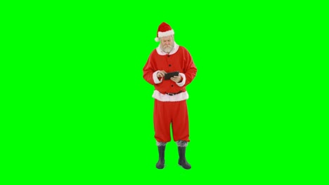 Santa-claus-using-digital-tablet