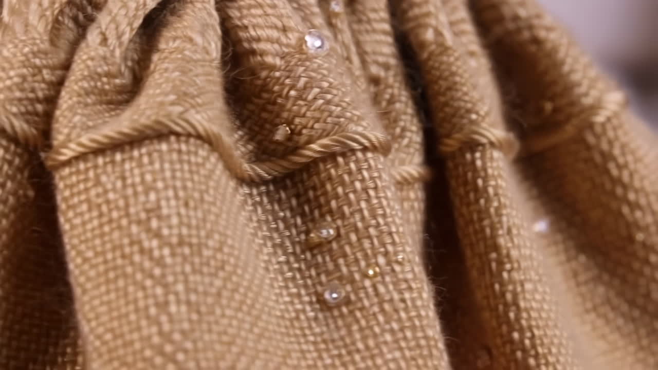 Close-up of Woven Fabric with Decorative Embellishments