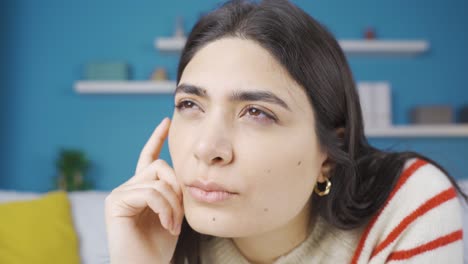close-up of thoughtful young woman.