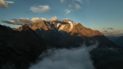 close aerial view over melezet italian electric dam alps mountains