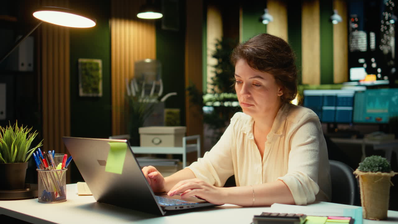 Vertical Video Businesswoman struggling to stay awake after an intense workload