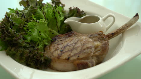 pork chop steak with salad