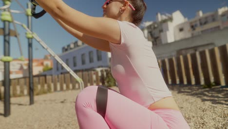 woman working out with resistance bands