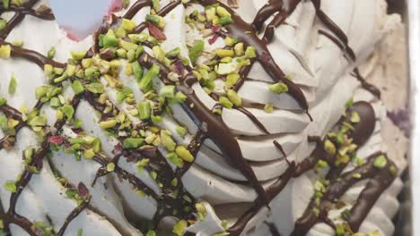 close-up of pistachio and chocolate gelato
