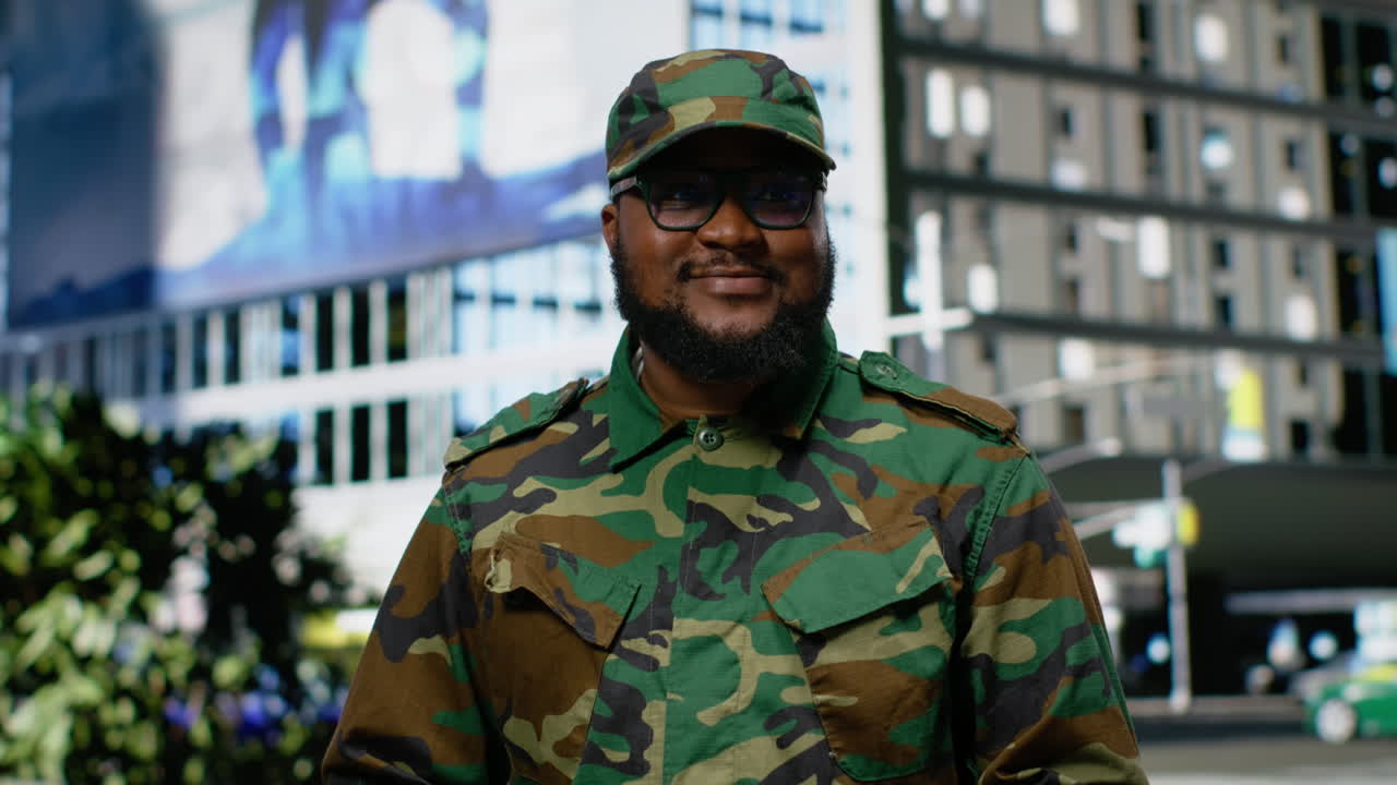 Adult male military service person walks through downtown center,