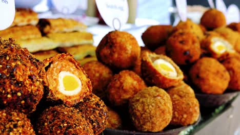 scotch eggs stand at a food market