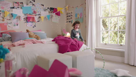 cute-little-girl-dancing-in-bedroom-having-fun-enjoying-weekend-morning-at-home-doing-funny-dance-moves-wearing-pajamas