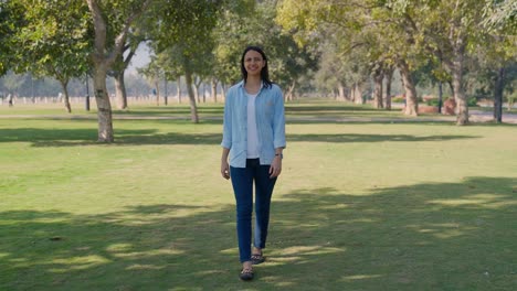 indian girl walking in a park