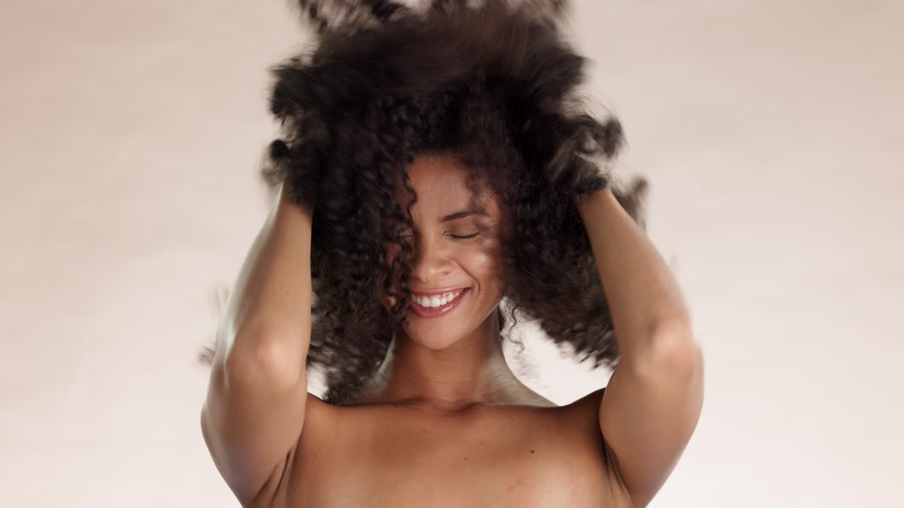 Beauty, hair and afro with woman in studio
