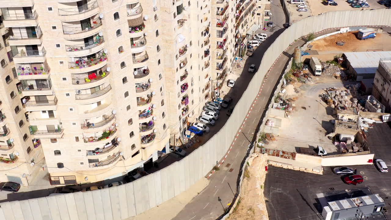 Security wall with Israeli idf watch tower Close to Shuafat Refugee Camp- Aerial
