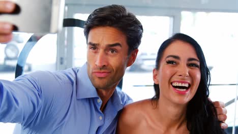 young friends are taking selfie with smartphone