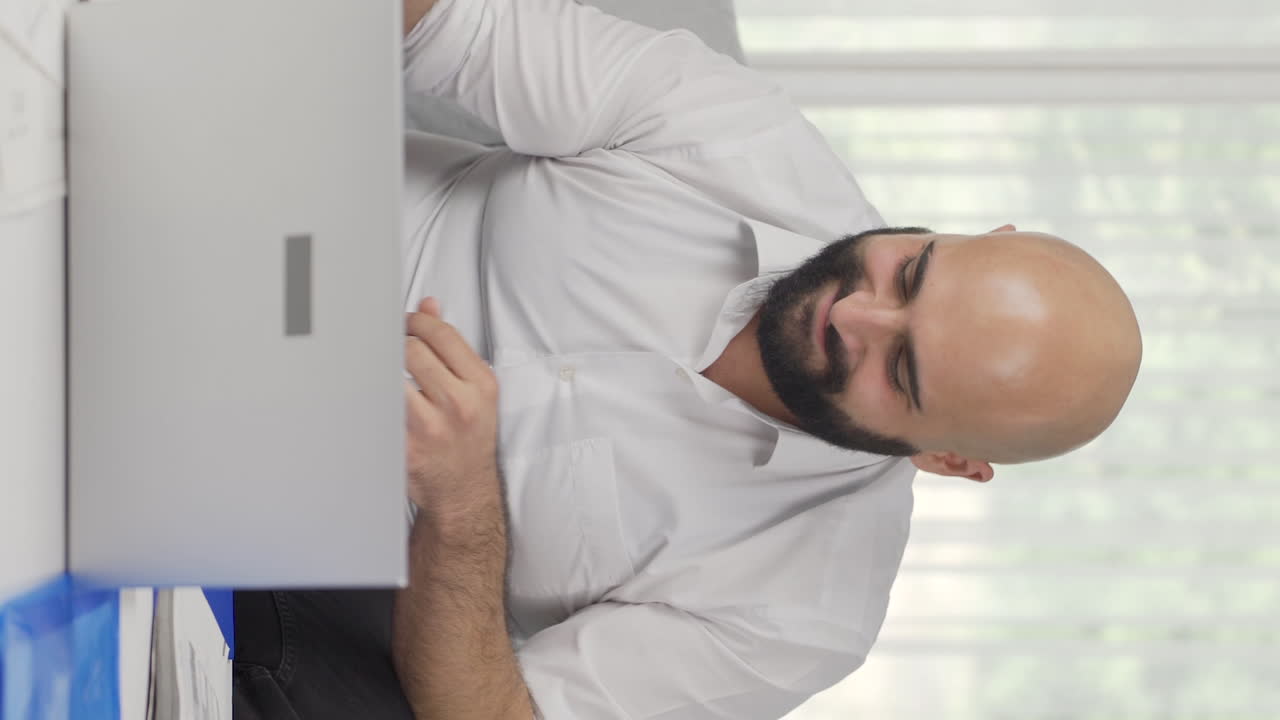 Vertical video of Home office worker man embarking on entrepreneurship.