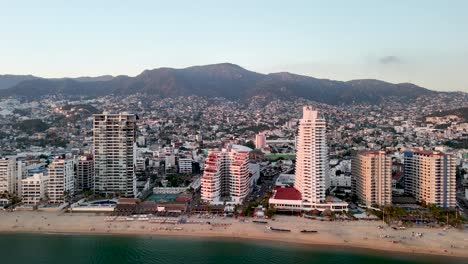shot of hotels destroyed in acapulco at sunset