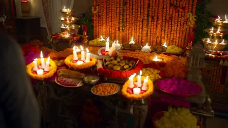 religious ceremony with candles and flowers