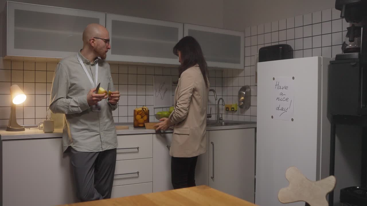 People in Office Kitchen