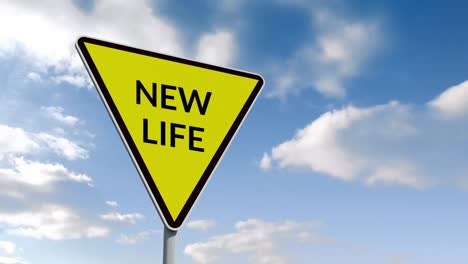 New-Life-on-yellow-road-sign-and-blue-sky-with-clouds