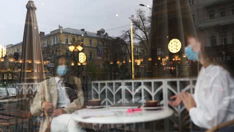 couple having coffee in a cafe on a cloudy day
