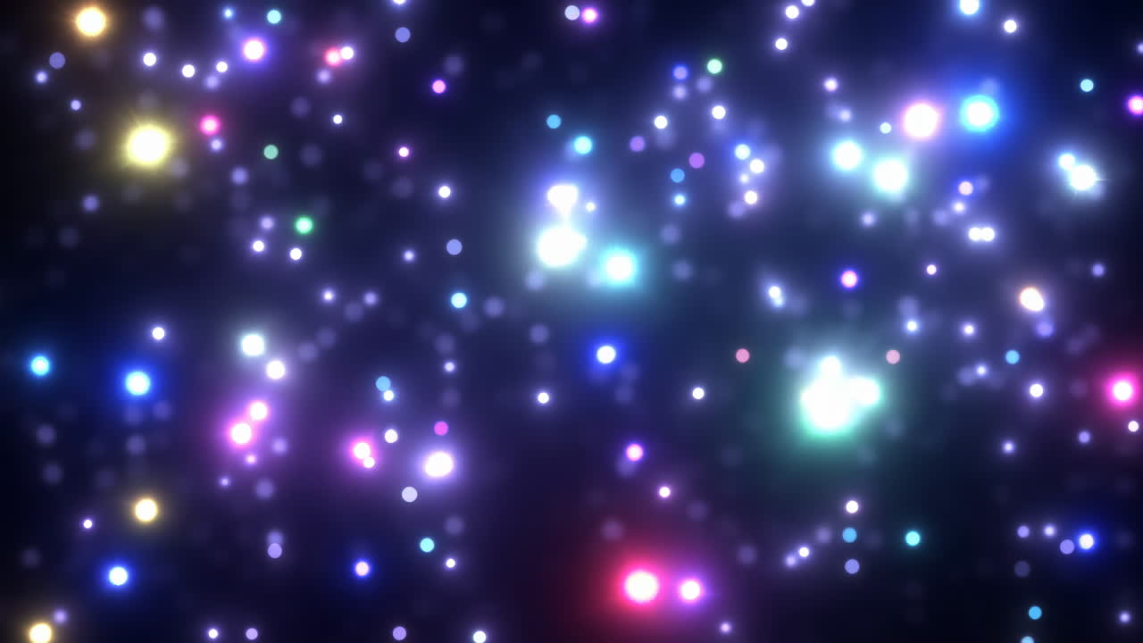 Particelle luminose colorate fluttuano su sfondo scuro, luci bokeh multicolori galleggiano e pulsano con un bagliore soffuso