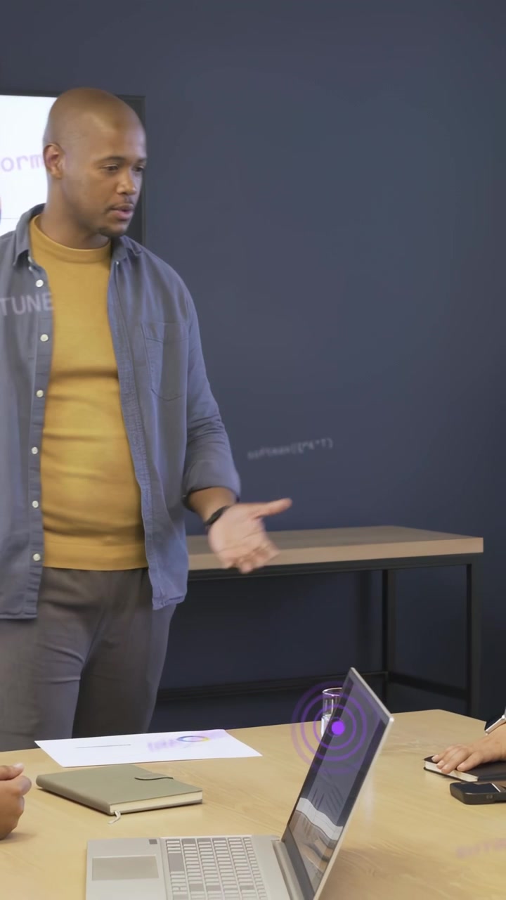 Vertical video: Lead holding sheet gesturing leading business review with pie chart inviting input