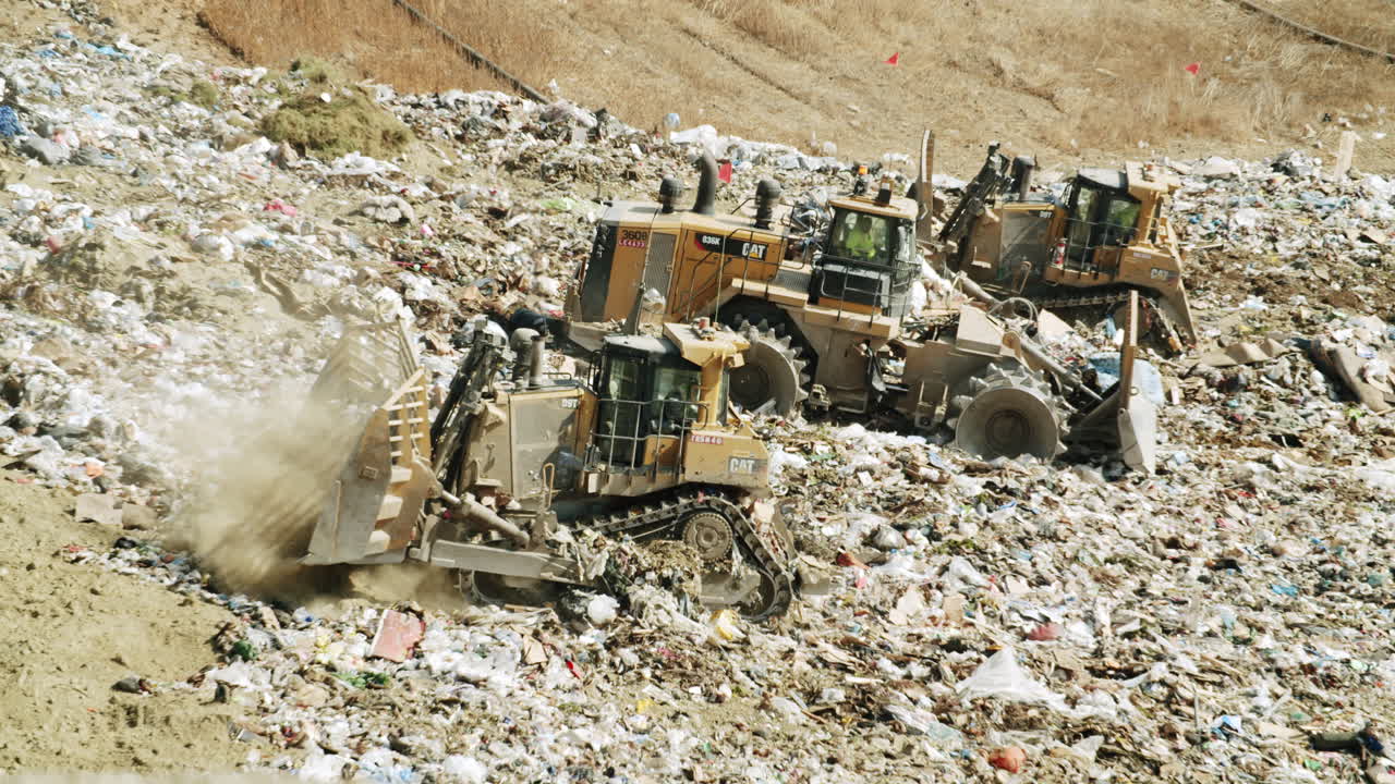 Heavy Machinery Working at a Landfill Site