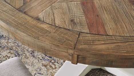 camera drifts downward across weathered planks and exposed grain