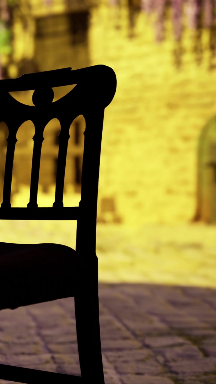 Wooden chair stands in outdoor setting with stone walls and plants nearby