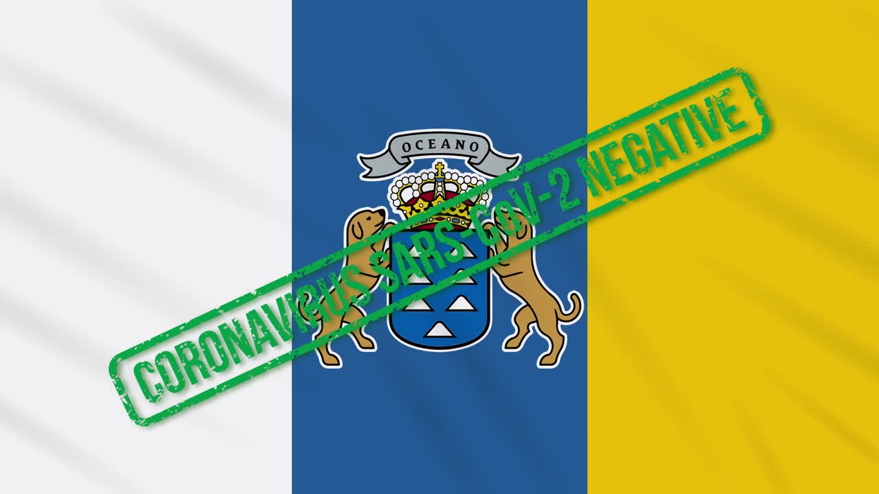 islas canarias ondeando la bandera con sello verde de libertad del coronavirus, bucle