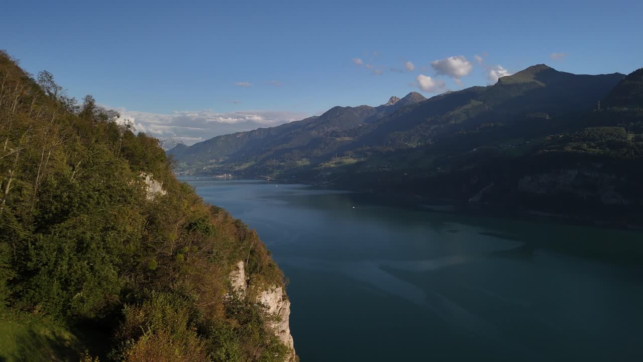 Drone view of Walensee lake and village in Amden, Canton Sankt Gallen, Switzerland