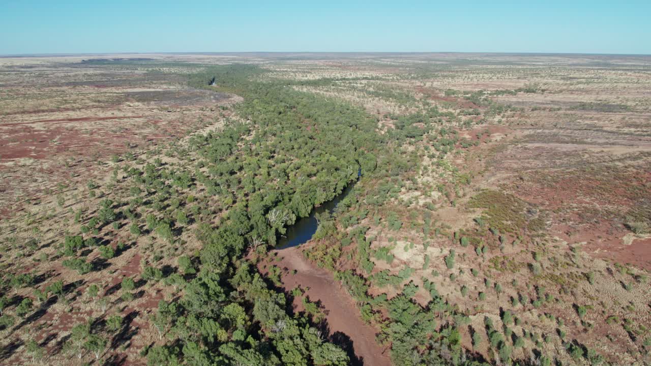 Aerial view over the winding Victoria River and landscape near Kalkarindji, Gurindji, Northern Territory, Australia, August 2022.