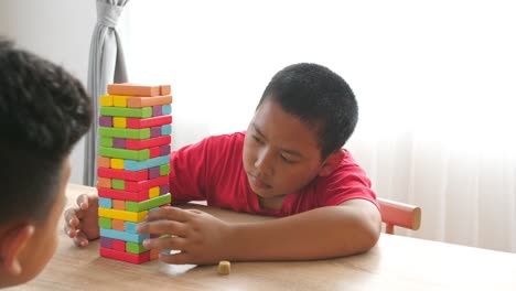 playing wood block tower game