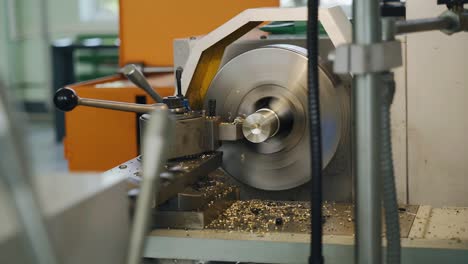 processing of a part on a lathe at an industrial enterprise. shooting the turner's work