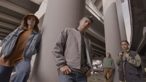 young people posing outdoors