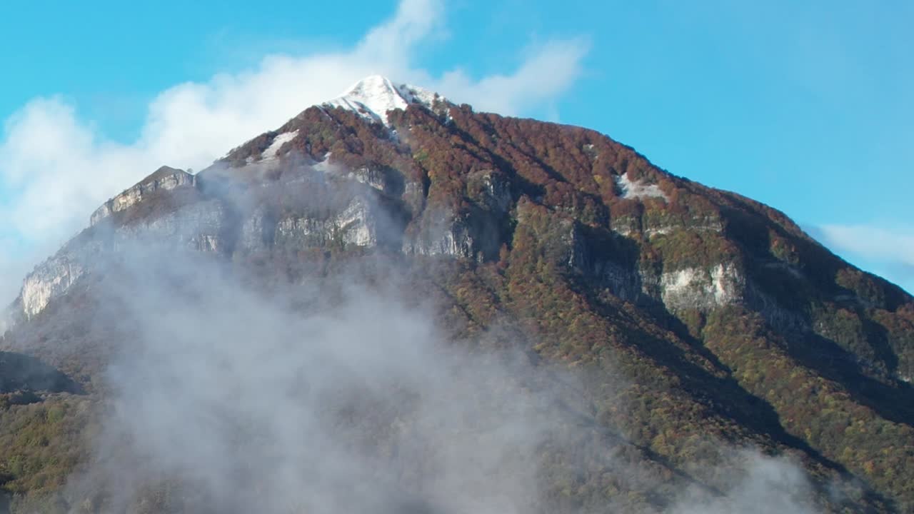 Scenic aerial view of the Alps in Italy with snow-capped peaks