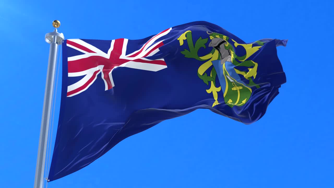 la bandera de las islas pitcairn ondeando en el viento con el cielo azul en un bucle lento