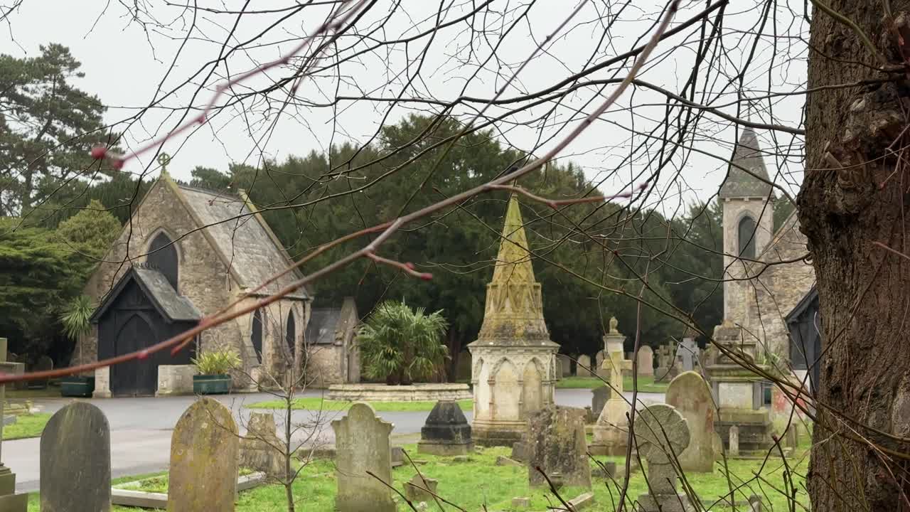 Historic Church and Old Cemetery in England on Overcast Day