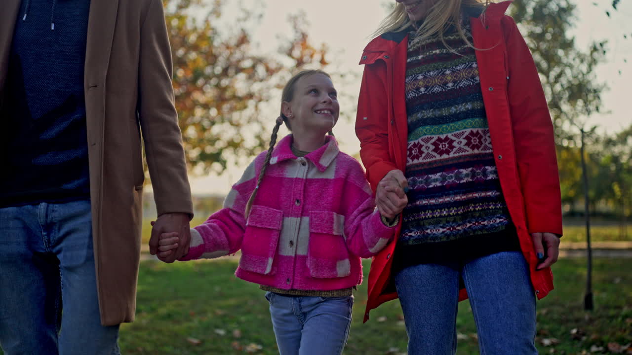 Family walking together in the park