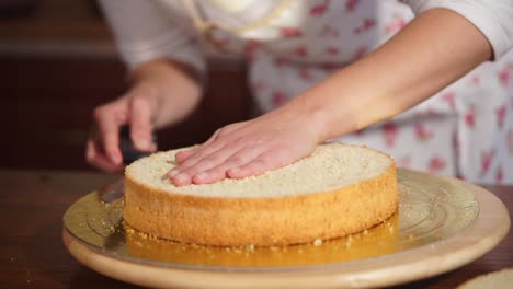 woman baking a layer cake