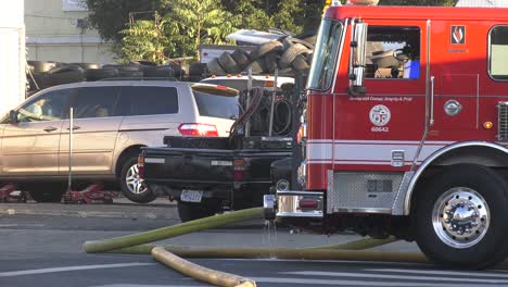 Fire-truck-on-scene-with-hoses