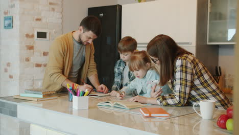 family helping children with homework in the kitchen