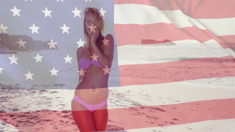 Animation-of-flag-of-usa-over-caucasian-woman-on-beach-in-summer