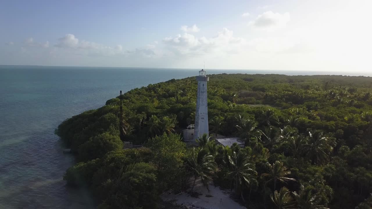 AERIAL: Lighthouse in Mexico at sunset
