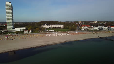 flight towards an empty beach in the morning