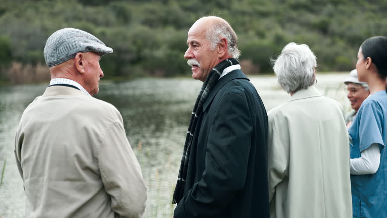 Group of people by a lake