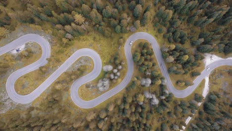 4K Aerial cinematic shot of the Dolomites’ famous Snake Road with vibrant fall colours. Italy_02