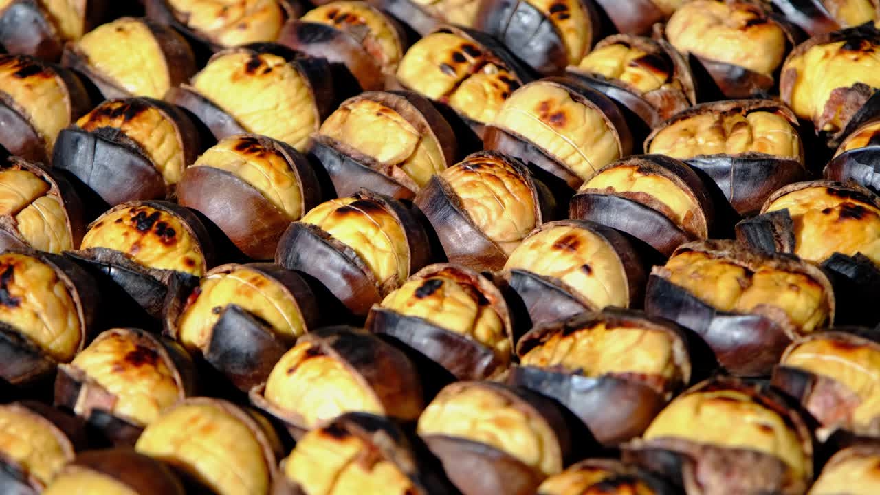 Close up of fresh, hot, grilled chestnuts. Roasted Chestnuts. Traditional street food of Istanbul.