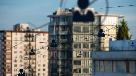 animation of network of connections with people icons over cityscape
