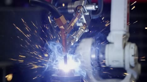 precision robotics in action: a robotic arm utilizing advanced technology for welding or cutting applications in a controlled environment
