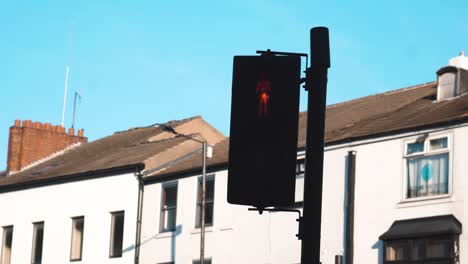 traffic lights changing from a pedestrians point of view stood waiting to cross